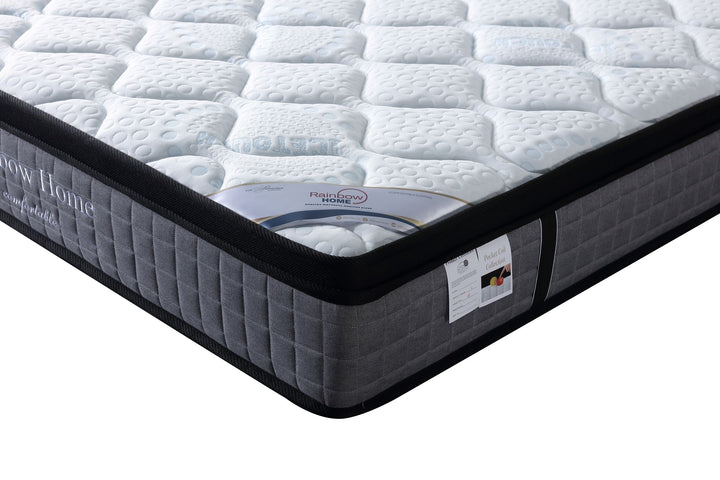 angle view of the corner of a grey pocket spring Rainbow Home mattress