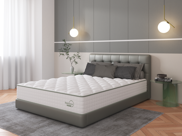 bedroom with angle view of the Zina memory foam pocket spring mattress from Rainbow Home on a grey bed base